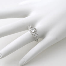 1.30 CTW Three Stone Halo Cubic Zirconia Ring